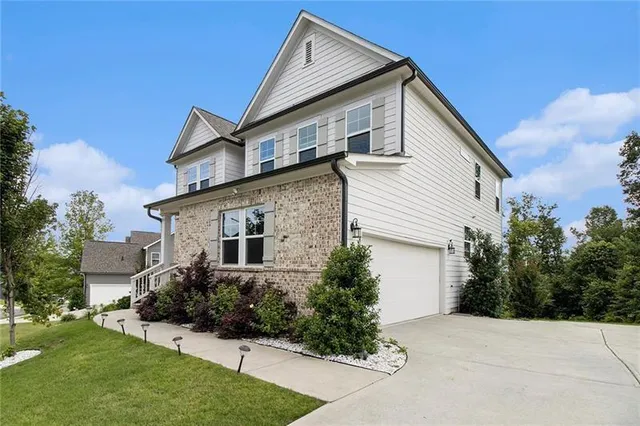 a view of house with garden