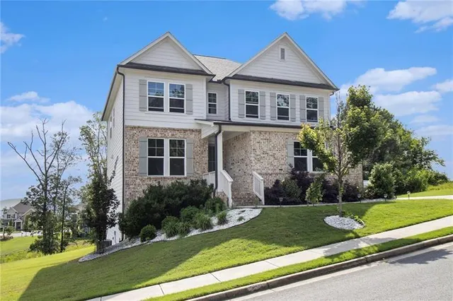 front view of a house with a yard