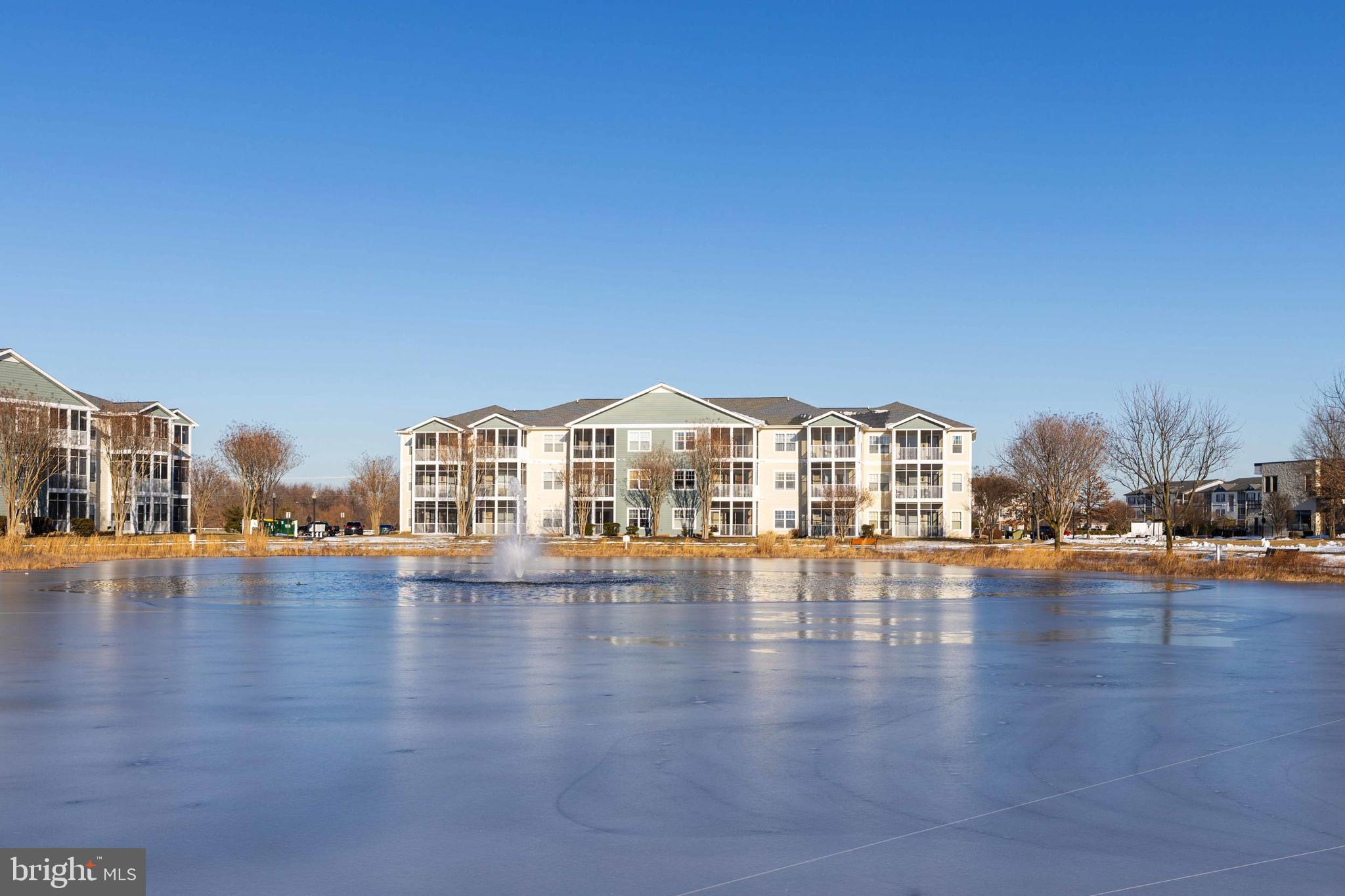 33192 North Village Loop, Unit 5202 Lewes, DE 19958 - Photo 1 of 42 Building from across the pond