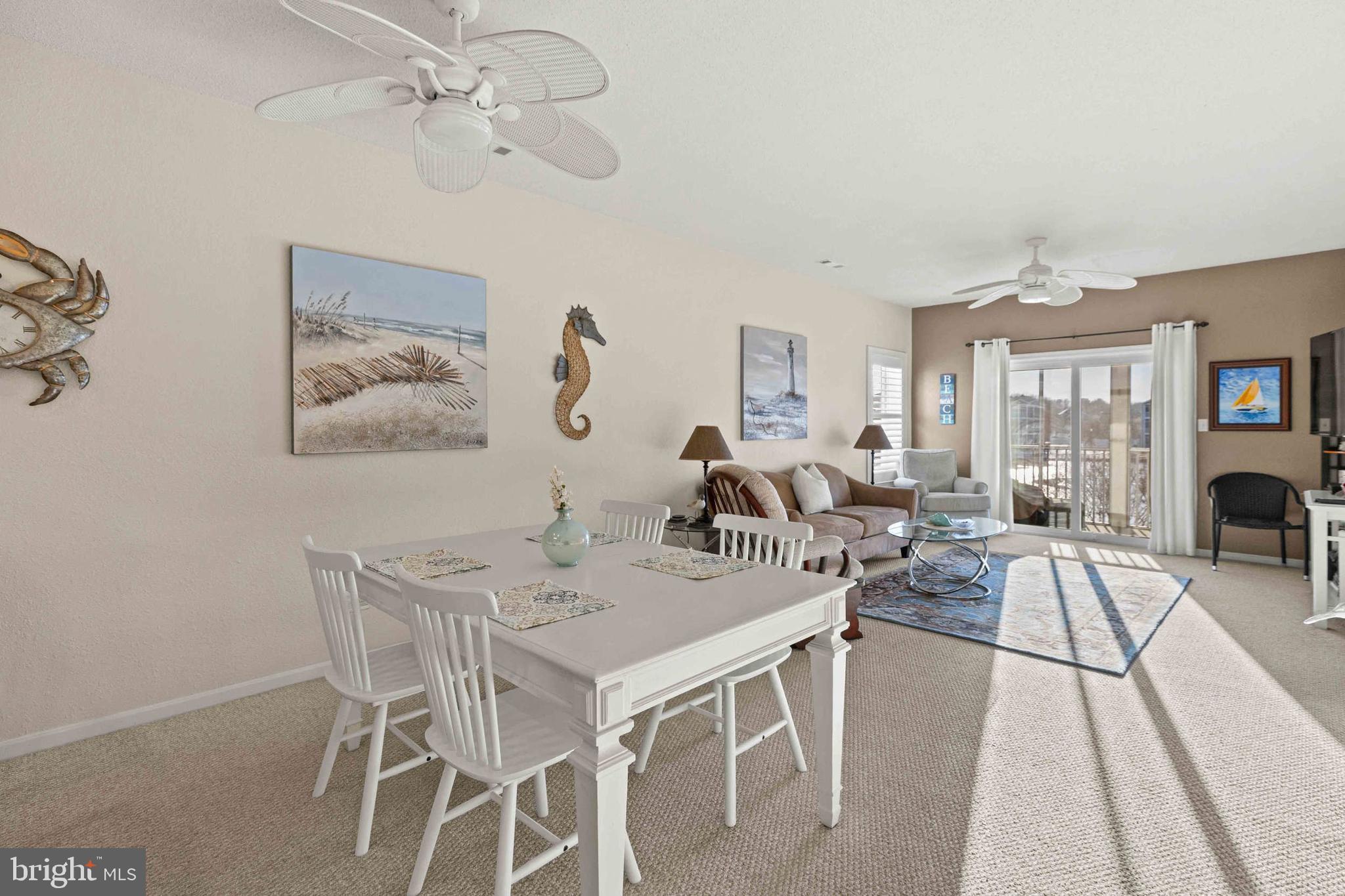 33192 North Village Loop, Unit 5202 Lewes, DE 19958 - Photo 14 of 42 Dining room looking into living room and balcony