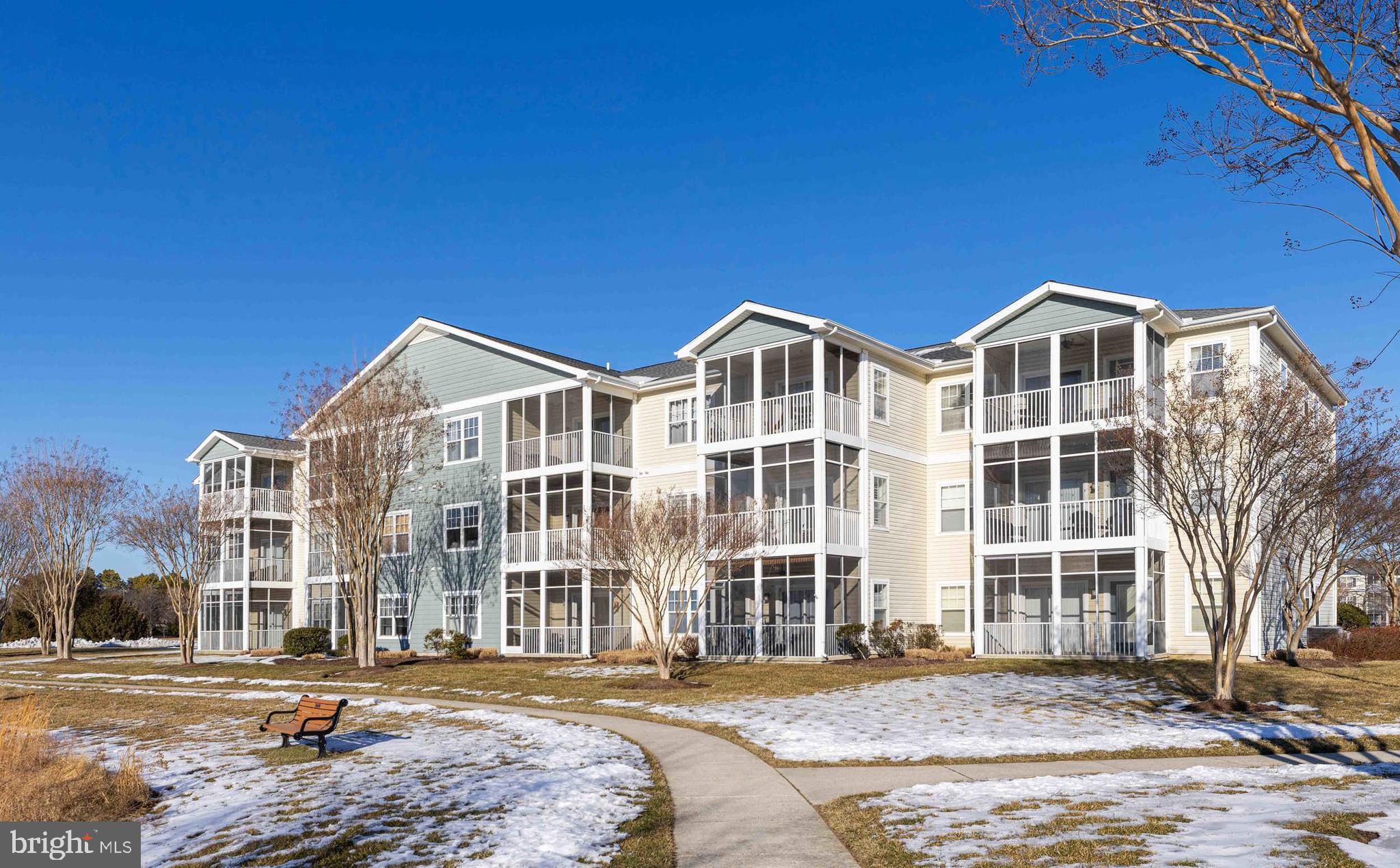33192 North Village Loop, Unit 5202 Lewes, DE 19958 - Photo 3 of 42 Walkway and Back of Building