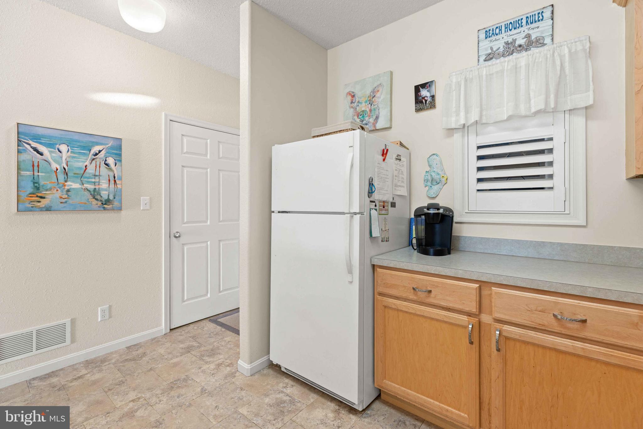33192 North Village Loop, Unit 5202 Lewes, DE 19958 - Photo 8 of 42 Storage closet at entrance into kitchen