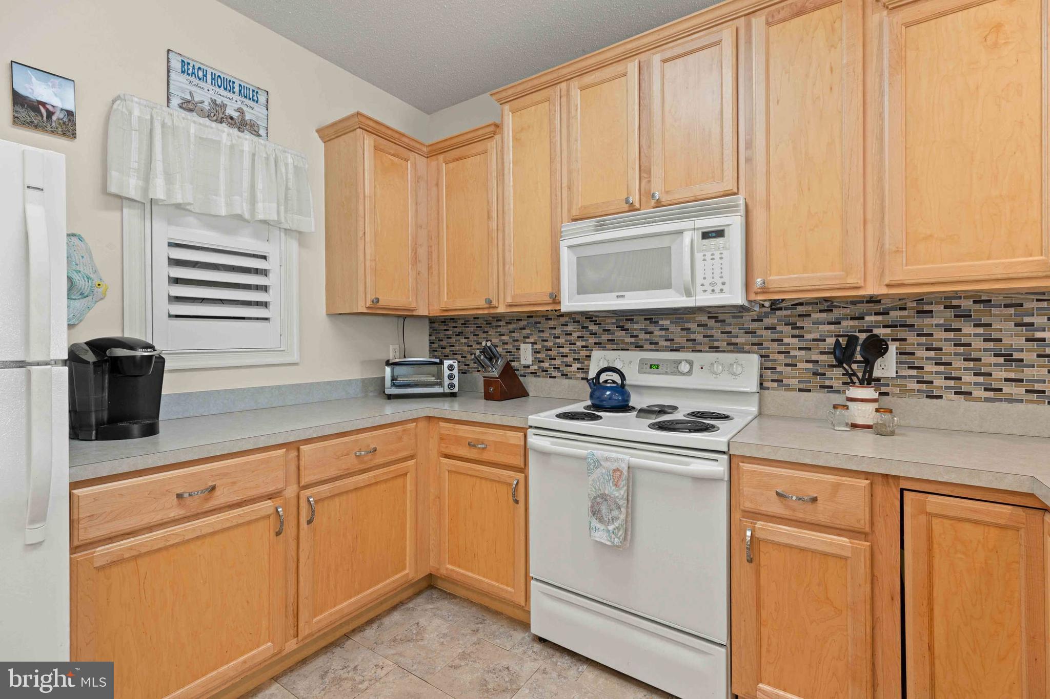 33192 North Village Loop, Unit 5202 Lewes, DE 19958 - Photo 10 of 42 Open kitchen with plenty of counter space