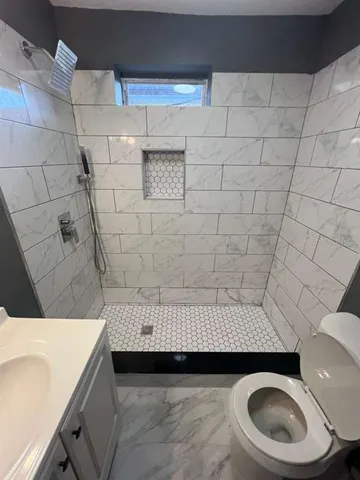 a bathroom with a sink and a toilet