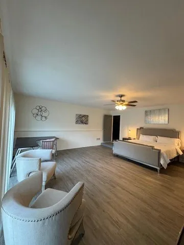 a living room with furniture and a table