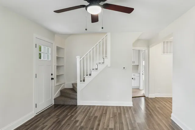 a view of entryway with wooden floor