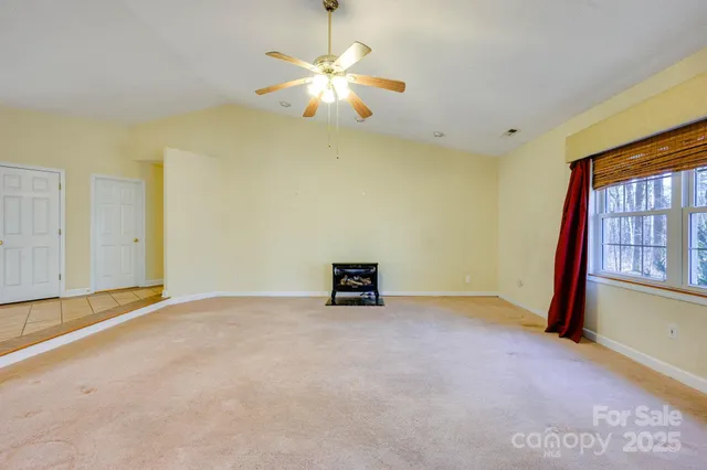 a view of empty room with a window