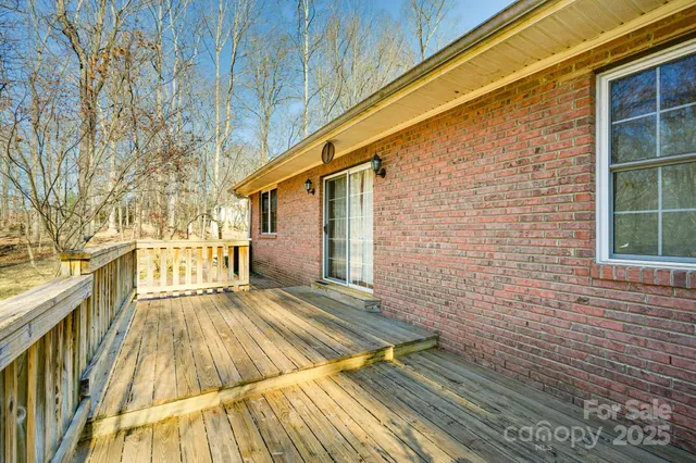 a view of backyard with a patio