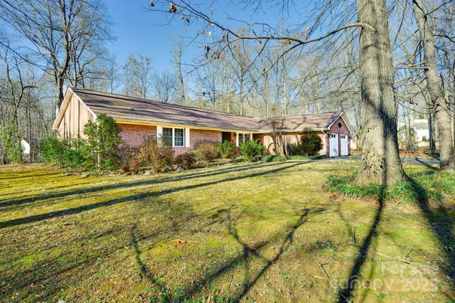 a view of swimming pool with outdoor seating