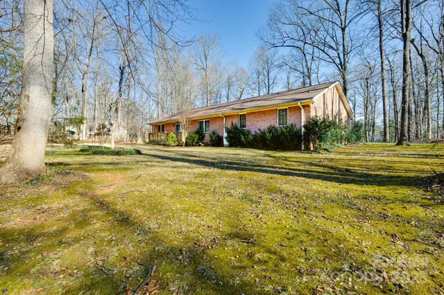 an aerial view of lake residential house with outdoor space
