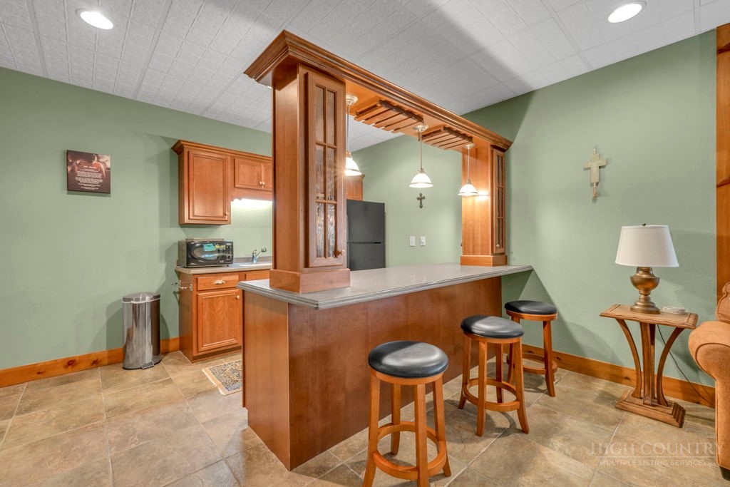 160 Outback Road Ferguson, NC 28624 - Photo 36 of 49 a view of a kitchen and dining room