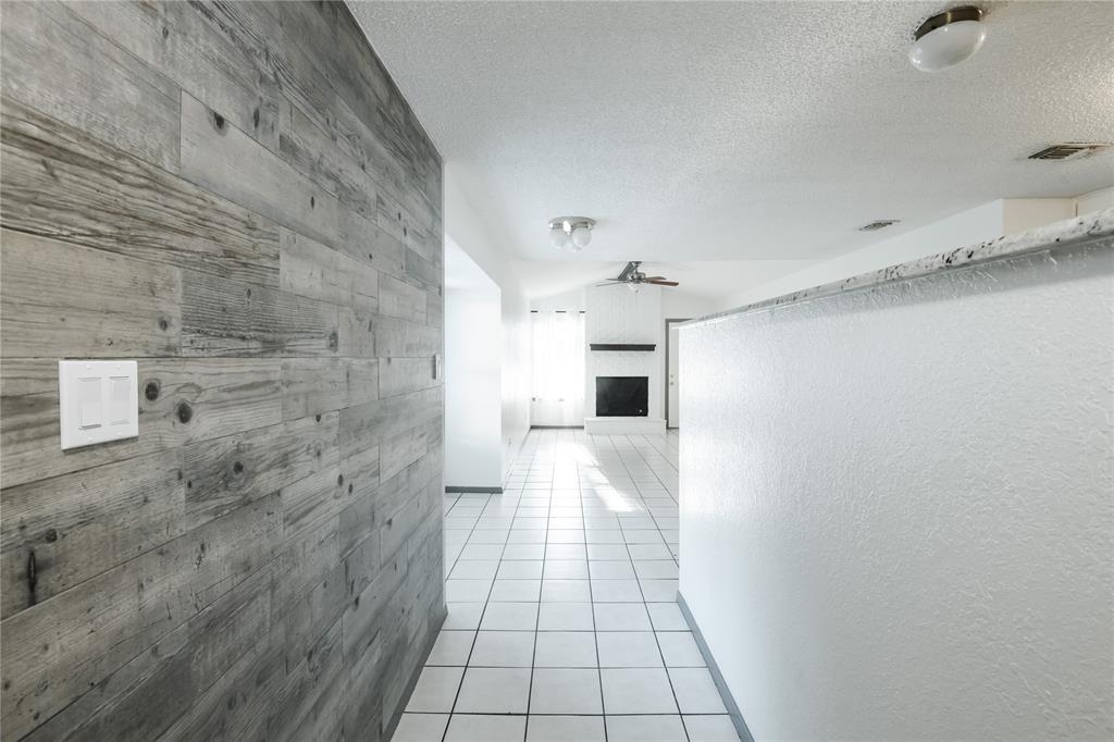 7324 Hyde Court Fort Worth, TX 76112 - Photo 20 of 20 a hallway with a door