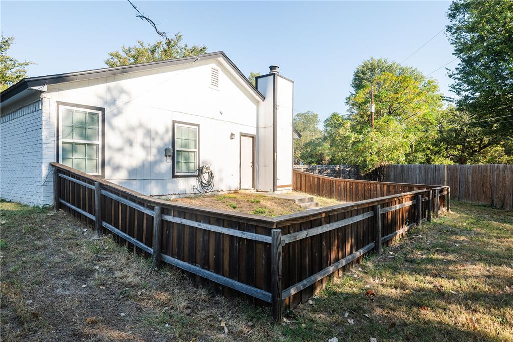 7324 Hyde Court Fort Worth, TX 76112 - Photo 5 of 20 a view of a balcony with wooden floor and fence