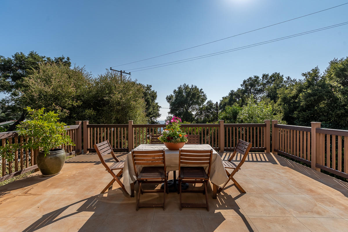 7 North San Marcos Road Santa Barbara, CA 93111 - Photo 13 of 43 a view of backyard with furniture and trees