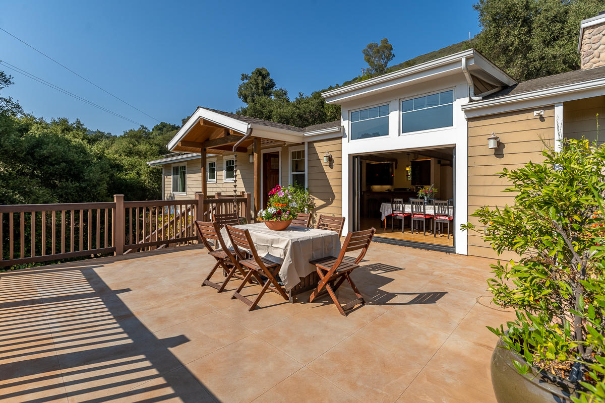 7 North San Marcos Road Santa Barbara, CA 93111 - Photo 14 of 43 a view of a house with wooden deck and furniture
