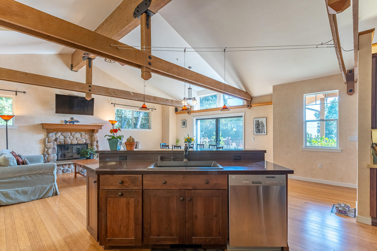 7 North San Marcos Road Santa Barbara, CA 93111 - Photo 7 of 43 a kitchen with a sink cabinets and wooden floor