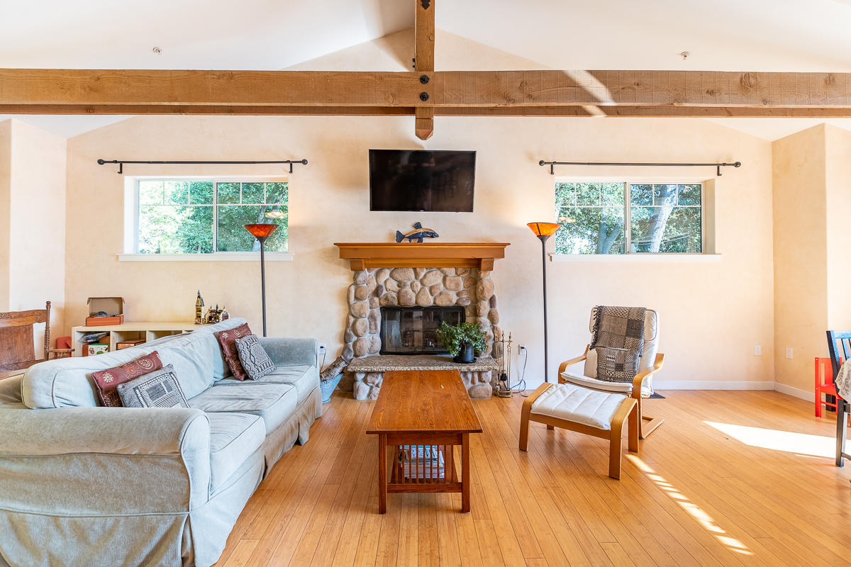 7 North San Marcos Road Santa Barbara, CA 93111 - Photo 8 of 43 a living room with furniture and a fireplace