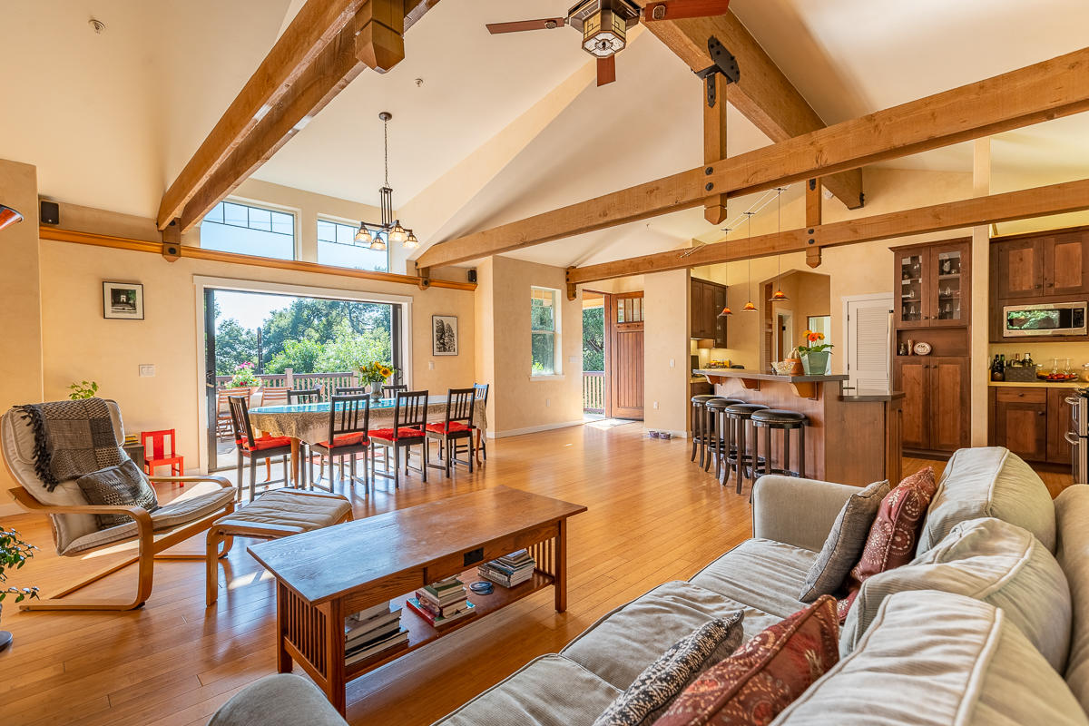 7 North San Marcos Road Santa Barbara, CA 93111 - Photo 9 of 43 a living room with furniture a couch and large windows