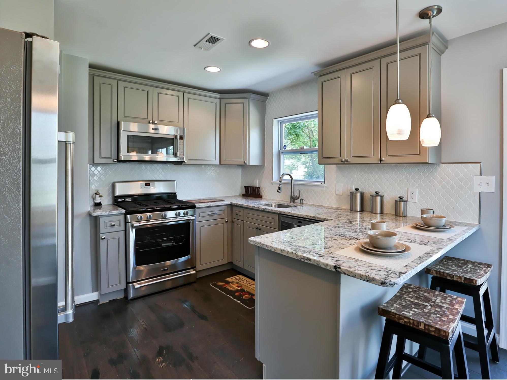 3422 Kimble Road Baltimore, MD 21244 - Photo 8 of 30 Stainless Steel Appliances And Tile Backsplash