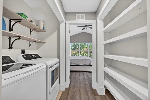a utility room with dryer and washer