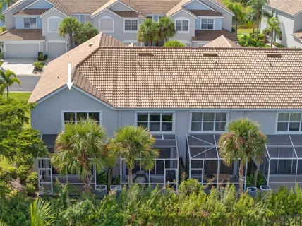 a view of house with outdoor space and sitting area