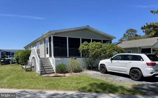 a view of a car in front of house