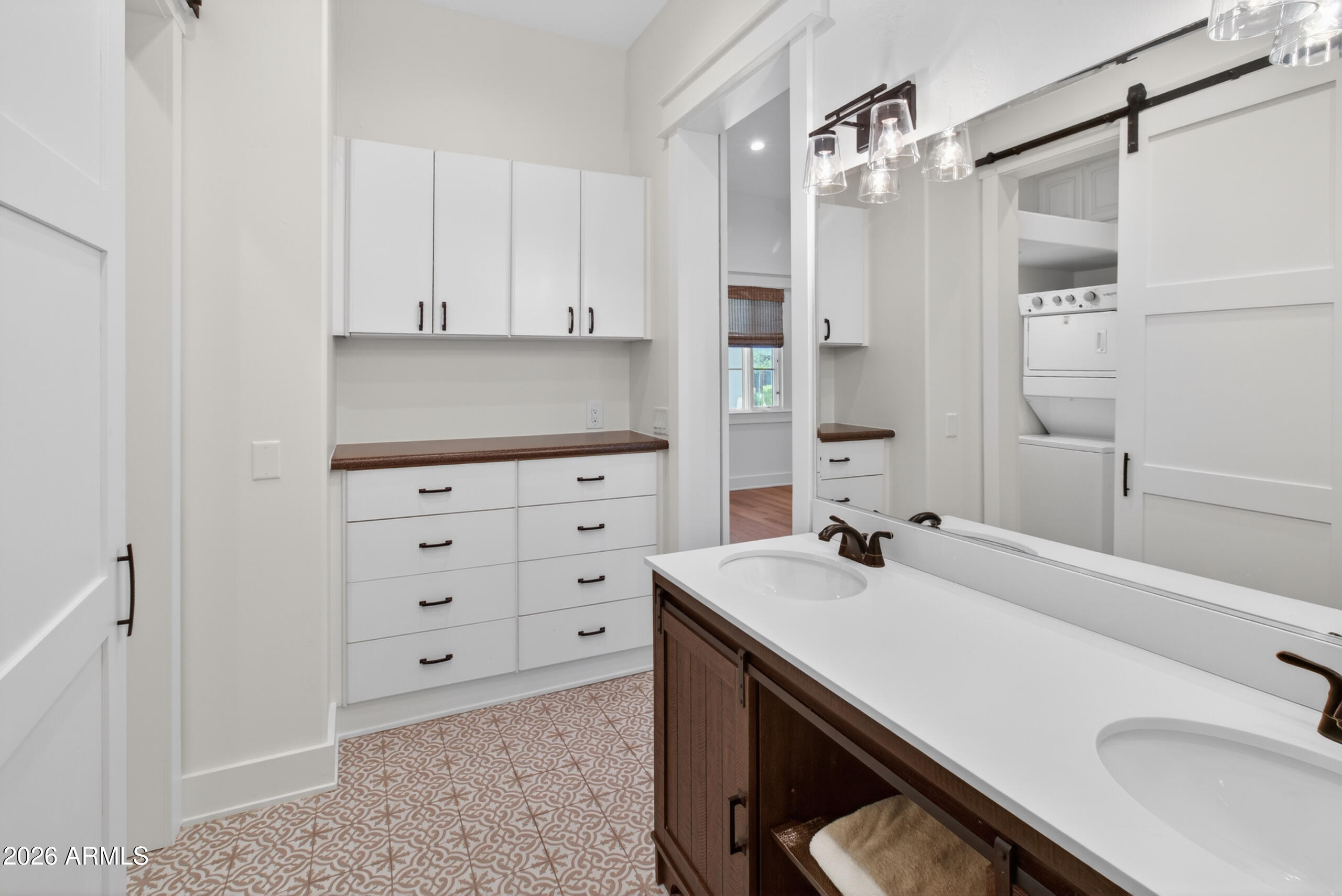 2677 East Queen Creek Road Gilbert, AZ 85297 - Photo 91 of 128 a bathroom with a sink double vanity and a mirror