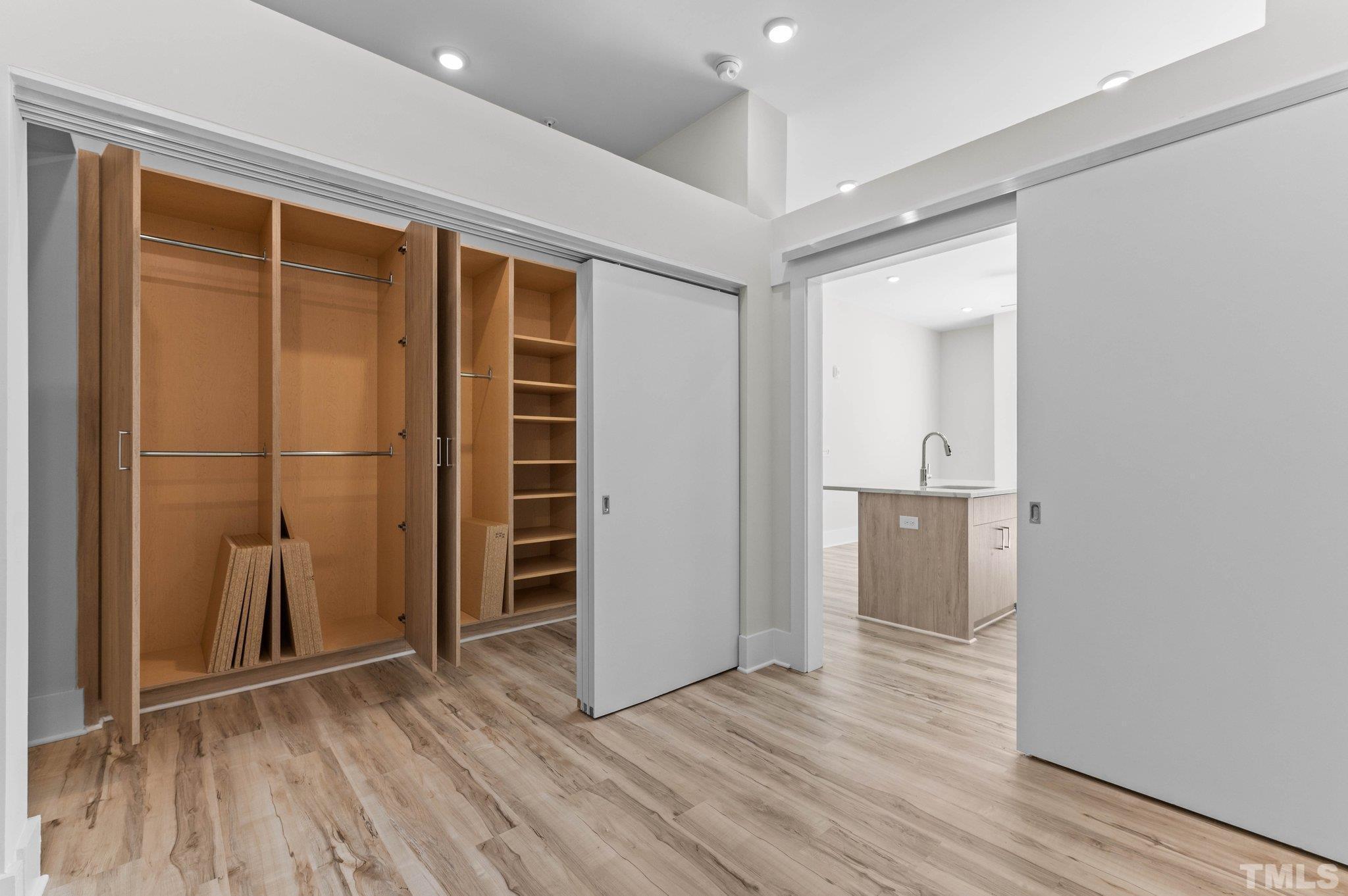 2441 Campus Shore Drive, Unit 309 Raleigh, NC 27606 - Photo 12 of 49 a view of wooden floor and windows in a room