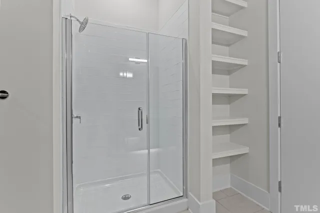 a view of a hallway with washer and dryer