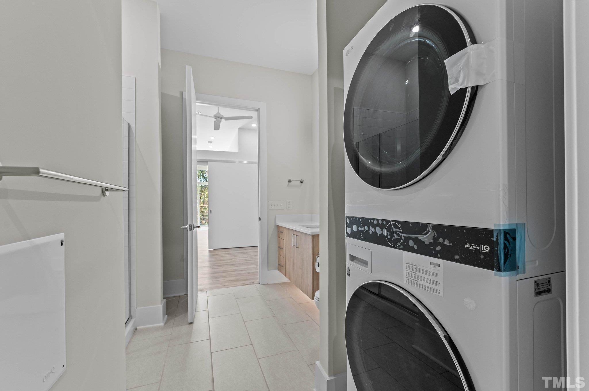 2441 Campus Shore Drive, Unit 309 Raleigh, NC 27606 - Photo 18 of 49 a view of a hallway with washer and dryer
