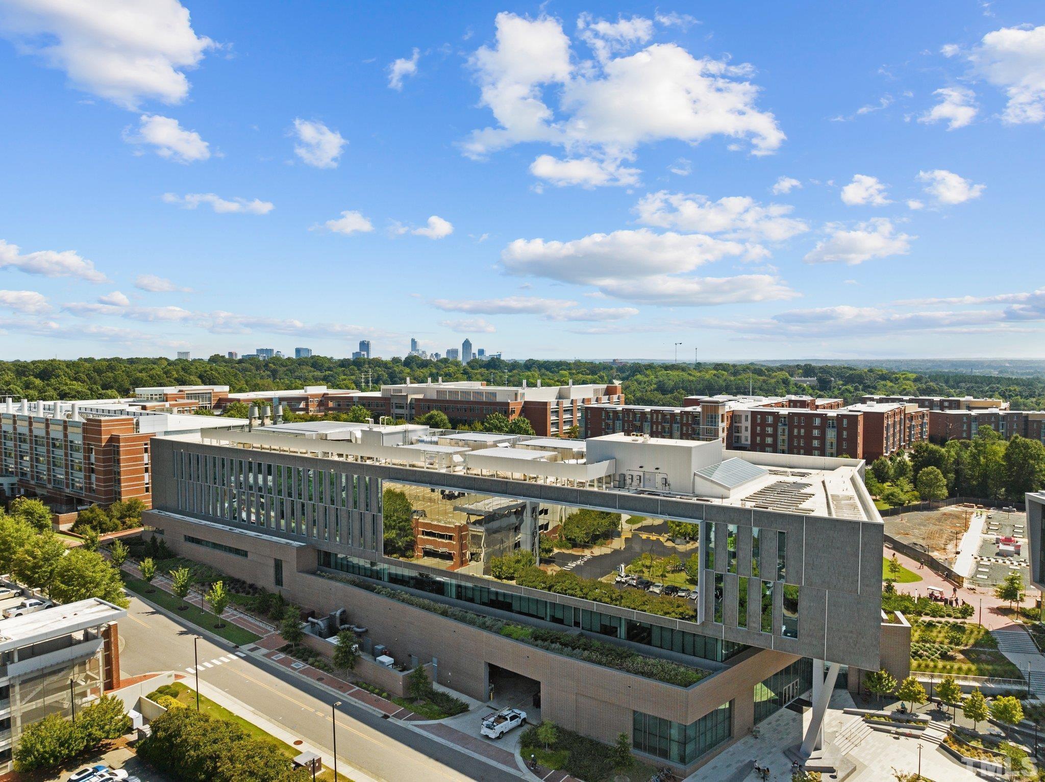 2441 Campus Shore Drive, Unit 309 Raleigh, NC 27606 - Photo 42 of 49 a view of a city from a terrace