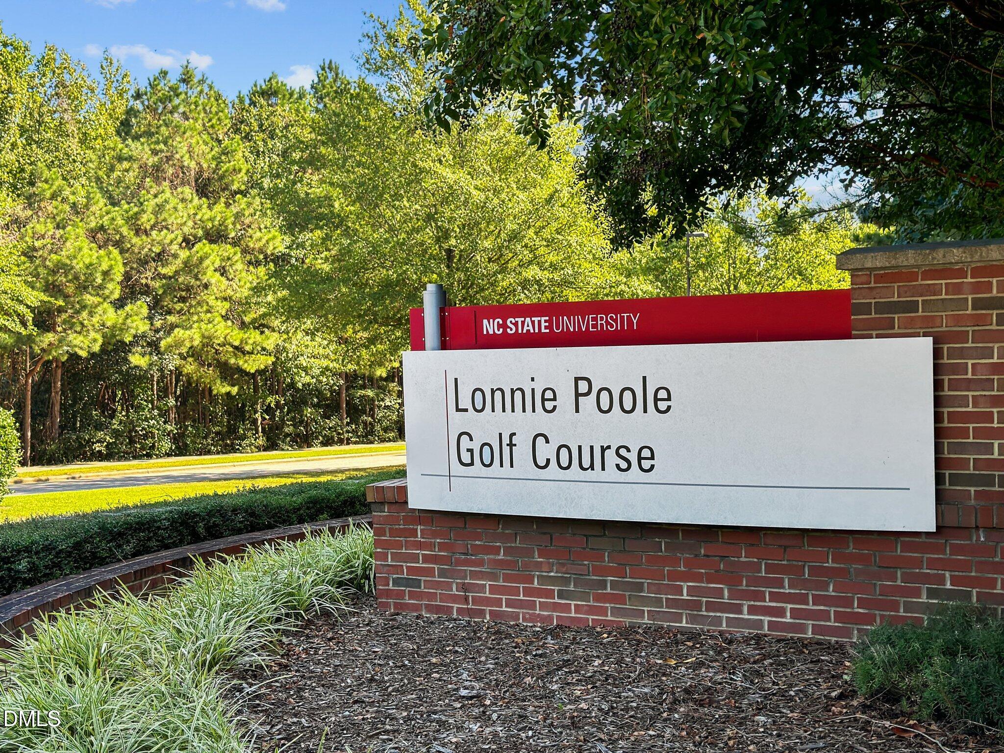 2441 Campus Shore Drive, Unit 309 Raleigh, NC 27606 - Photo 45 of 49 a sign on the side of a building