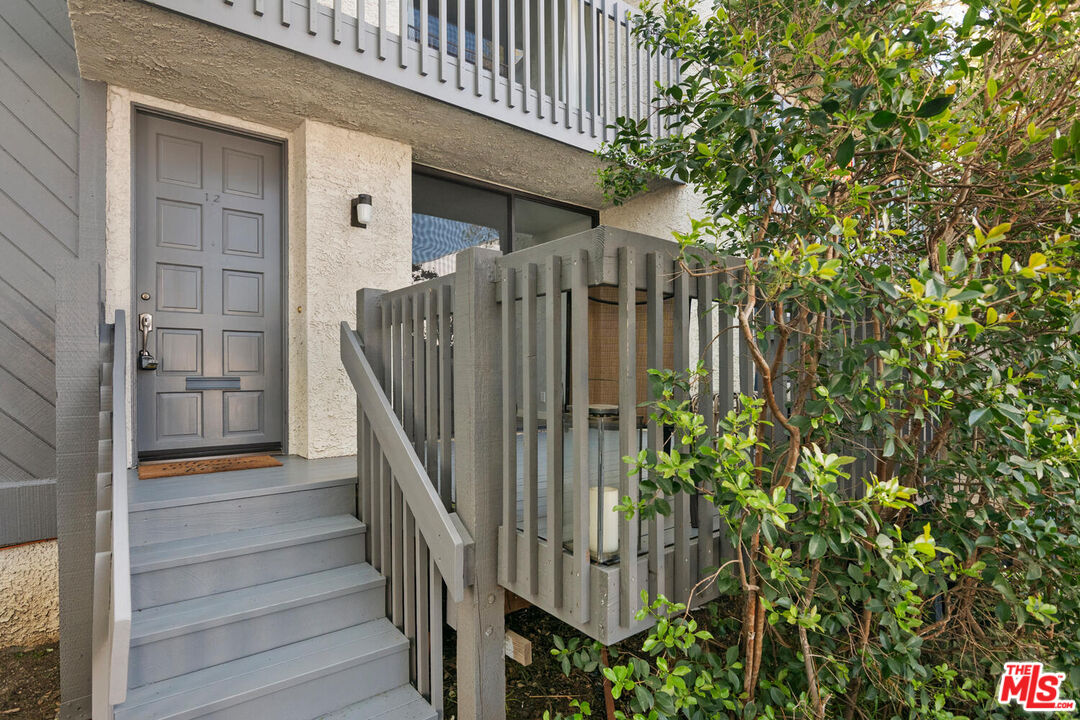 29239 Heathercliff Road, Unit 12 Malibu, CA 90265 - Photo 3 of 32 a view of outdoor space and deck