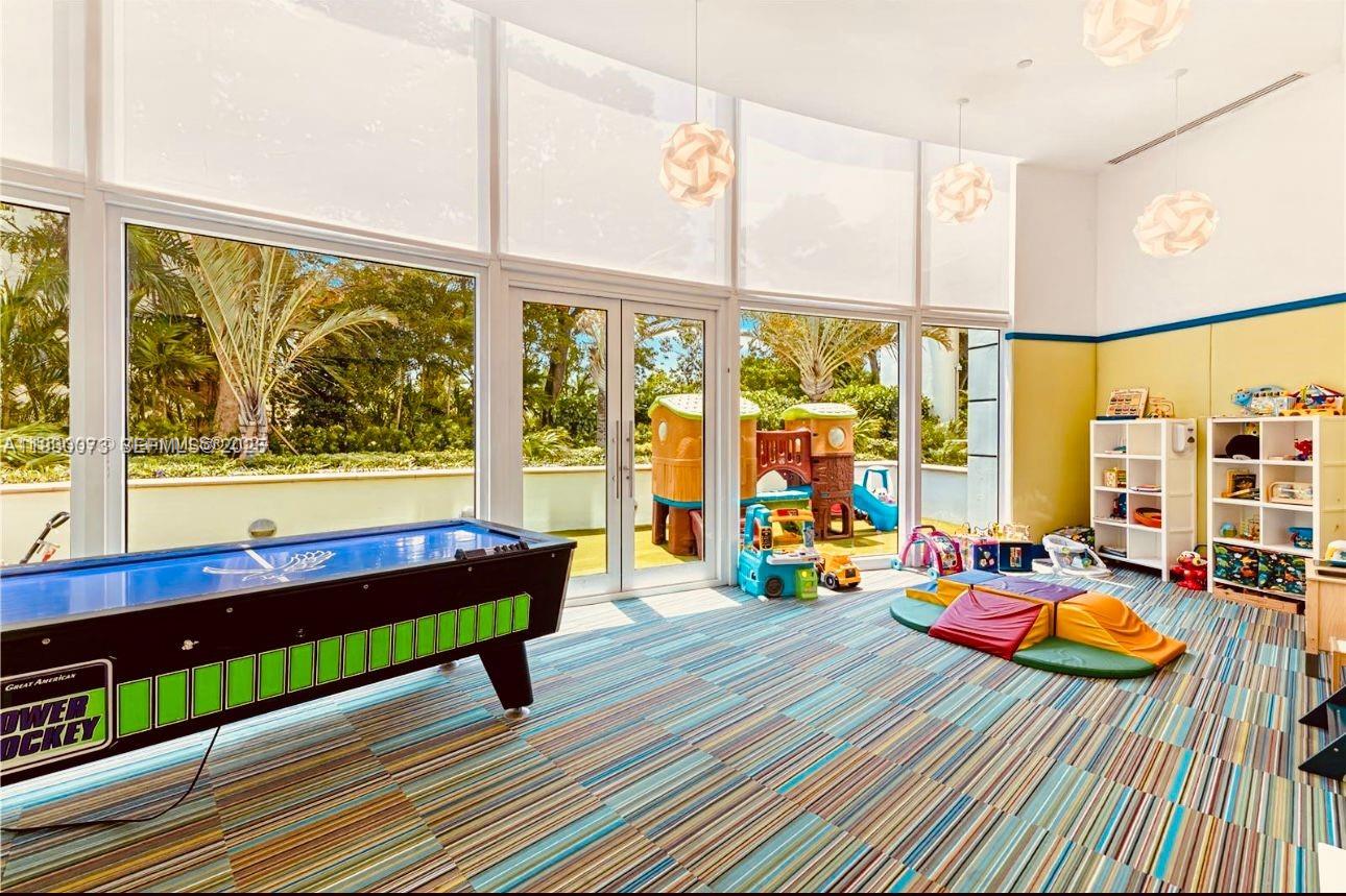 2127 Brickell Avenue, Unit 1505 Miami, FL 33129 - Photo 15 of 37 a reading room with window