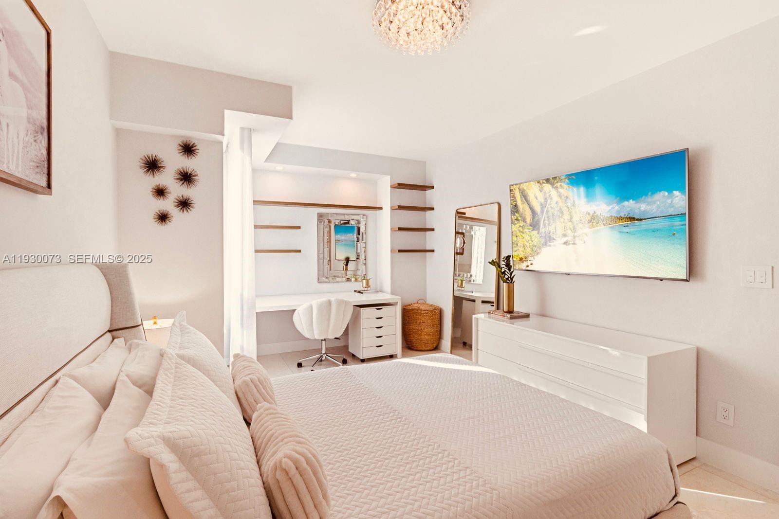 2127 Brickell Avenue, Unit 1505 Miami, FL 33129 - Photo 17 of 37 a bedroom with a bed and a flat screen tv