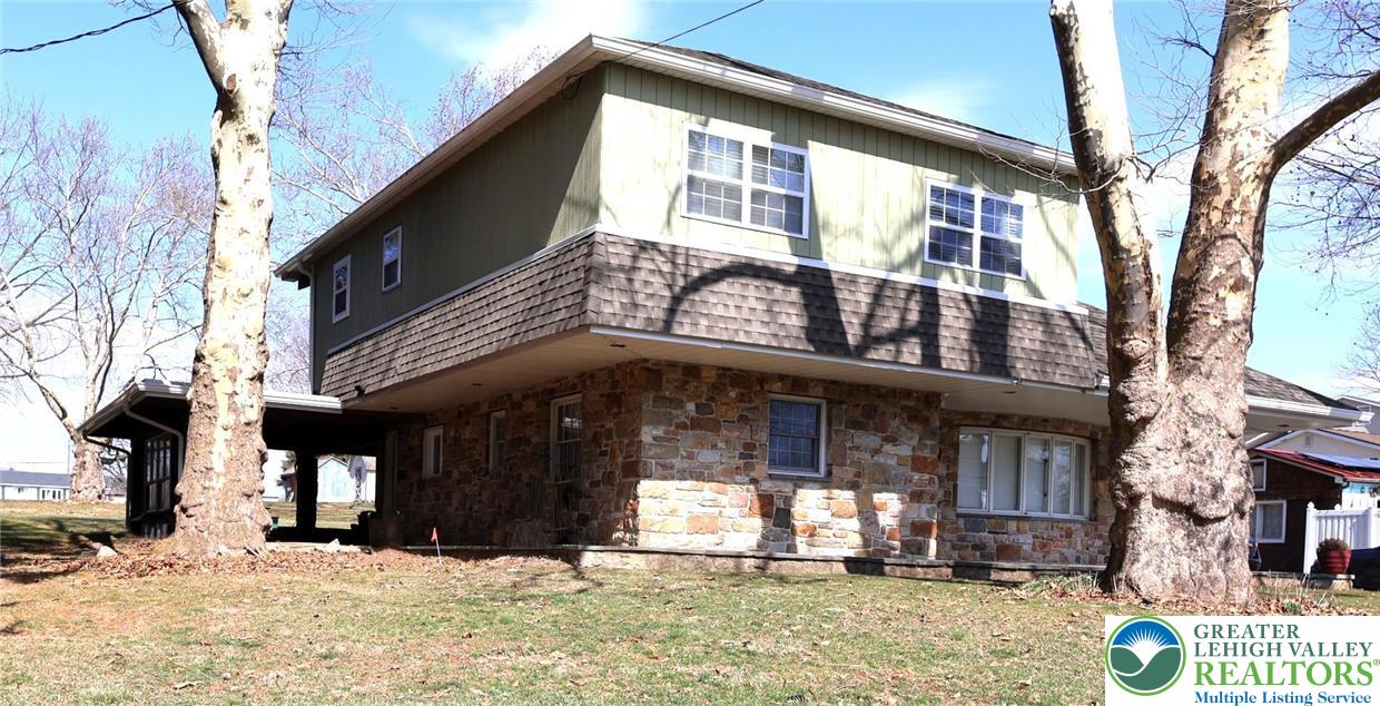8297 Mertztown Road Lower Macungie Township, PA 18011 - Photo 2 of 22 a view of a house with a yard