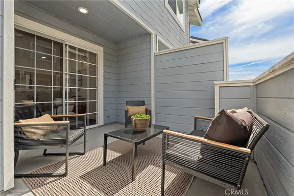 a building outdoor space with patio furniture