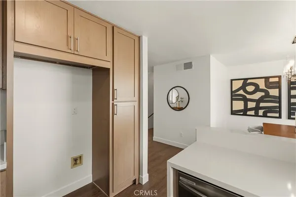 a view of a storage and utility room with closet