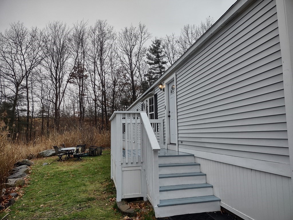81 Rabbit Road Salisbury, MA 01952 - Photo 3 of 21 a view of a backyard with stairs