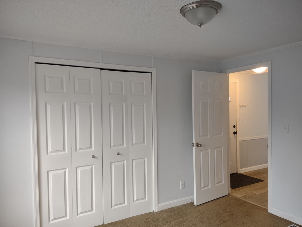 81 Rabbit Road Salisbury, MA 01952 - Photo 5 of 21 a view of a room with a wardrobe