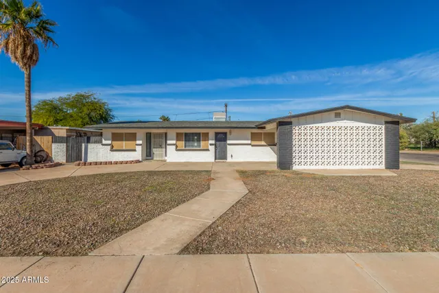 front view of a house with a street