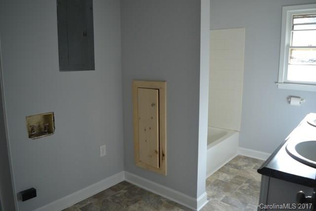 2665 Center Road Chester, SC 29706 - Photo 9 of 12 a view of bathroom with a sink mirror and window