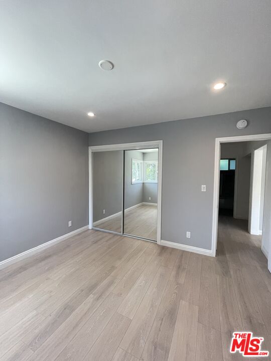 280 Grandview Street Pasadena, CA 91104 - Photo 11 of 34 wooden floor in an empty room with a window