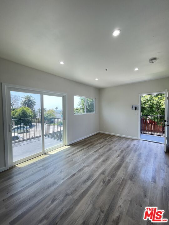 280 Grandview Street Pasadena, CA 91104 - Photo 22 of 34 a view of an empty room and wooden floor