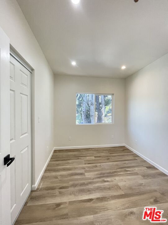 280 Grandview Street Pasadena, CA 91104 - Photo 25 of 34 wooden floor in an empty room with a gallery