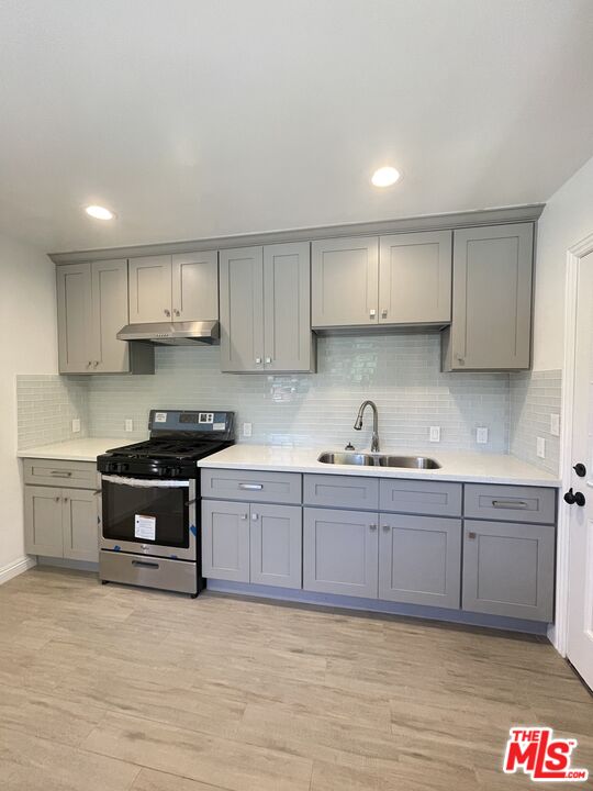 280 Grandview Street Pasadena, CA 91104 - Photo 7 of 34 a kitchen with stainless steel appliances granite countertop a sink and cabinets