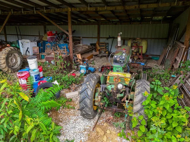 an outdoor space with lots of green space