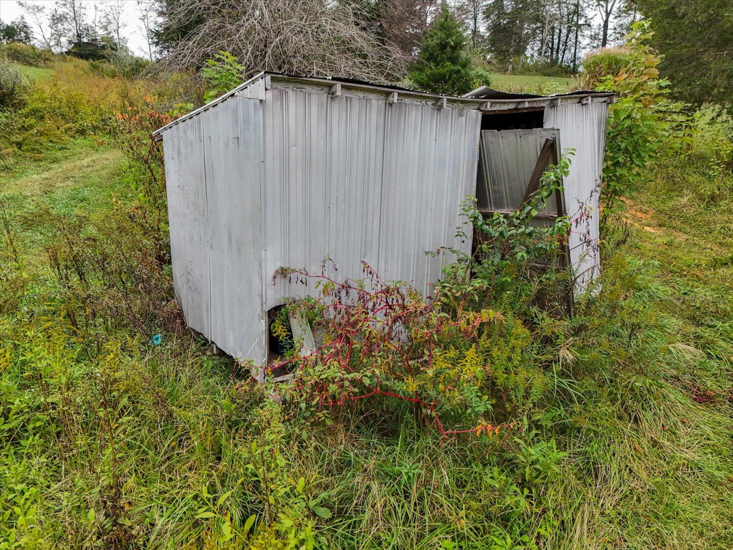 6481 Roanoke Road Fincastle, VA 24090 - Photo 18 of 47 a view of a backyard with plants