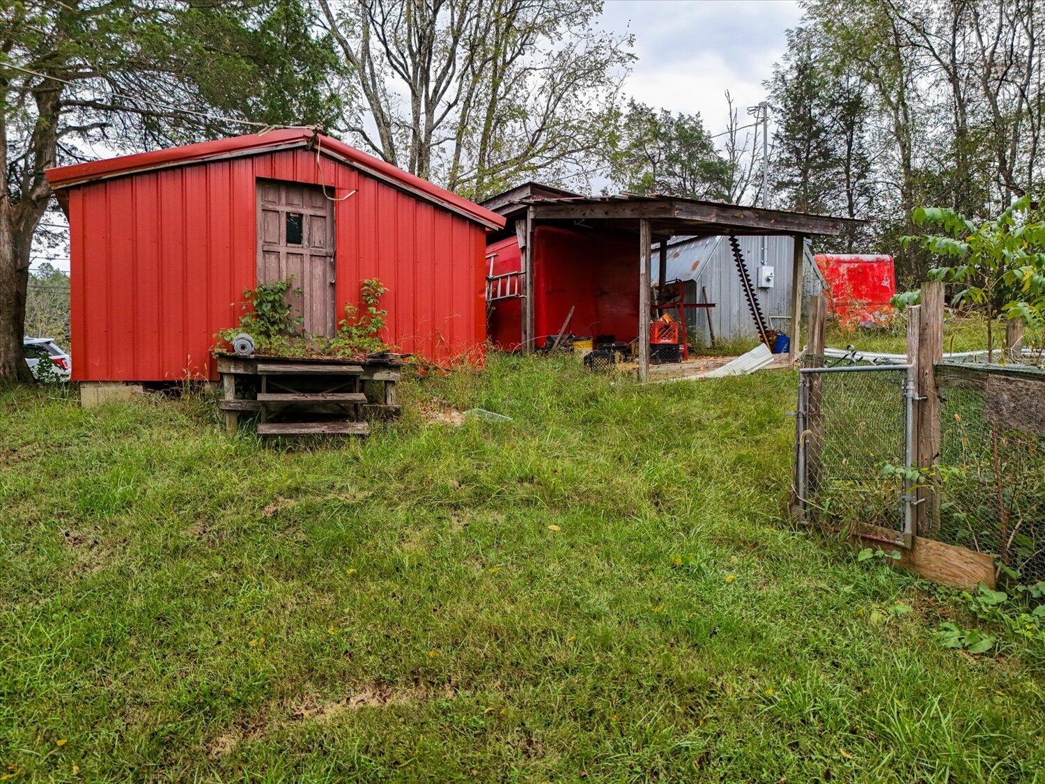 6481 Roanoke Road Fincastle, VA 24090 - Photo 24 of 47 a front view of a house with garden