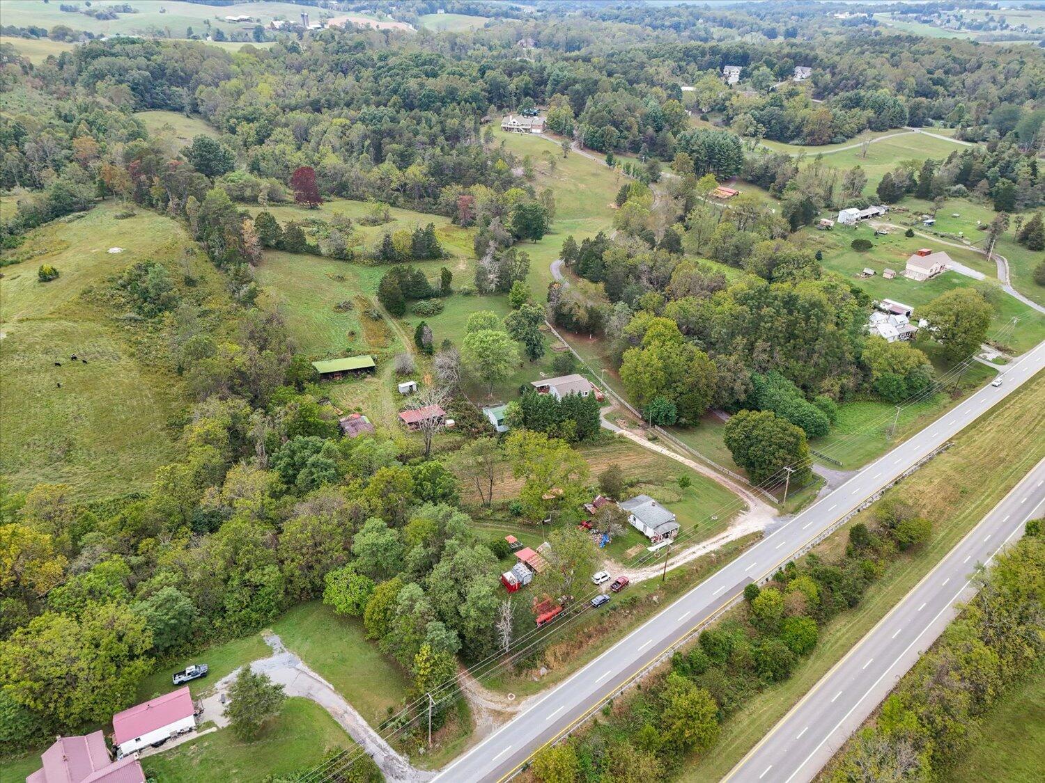 6481 Roanoke Road Fincastle, VA 24090 - Photo 27 of 47 a view of a garden with a wooden floor